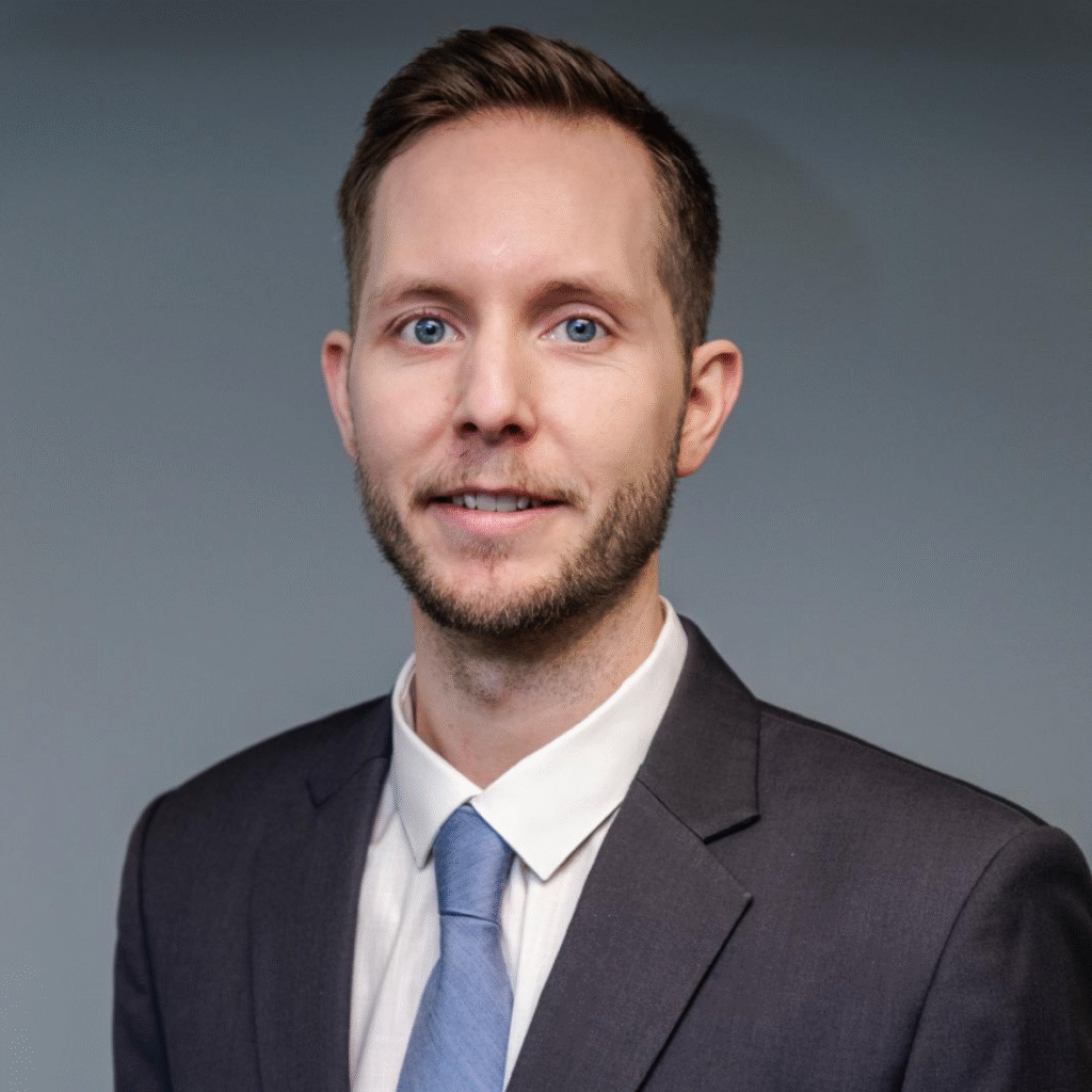 Nick Hanssmann Headshot e1732122520925