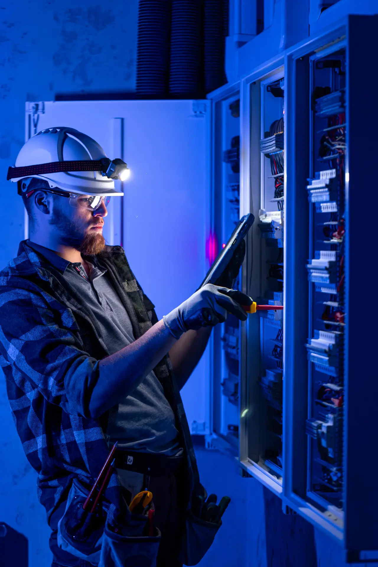 electrician in overalls focused on work in switch 2025 03 16 01 19 21 utc scaled